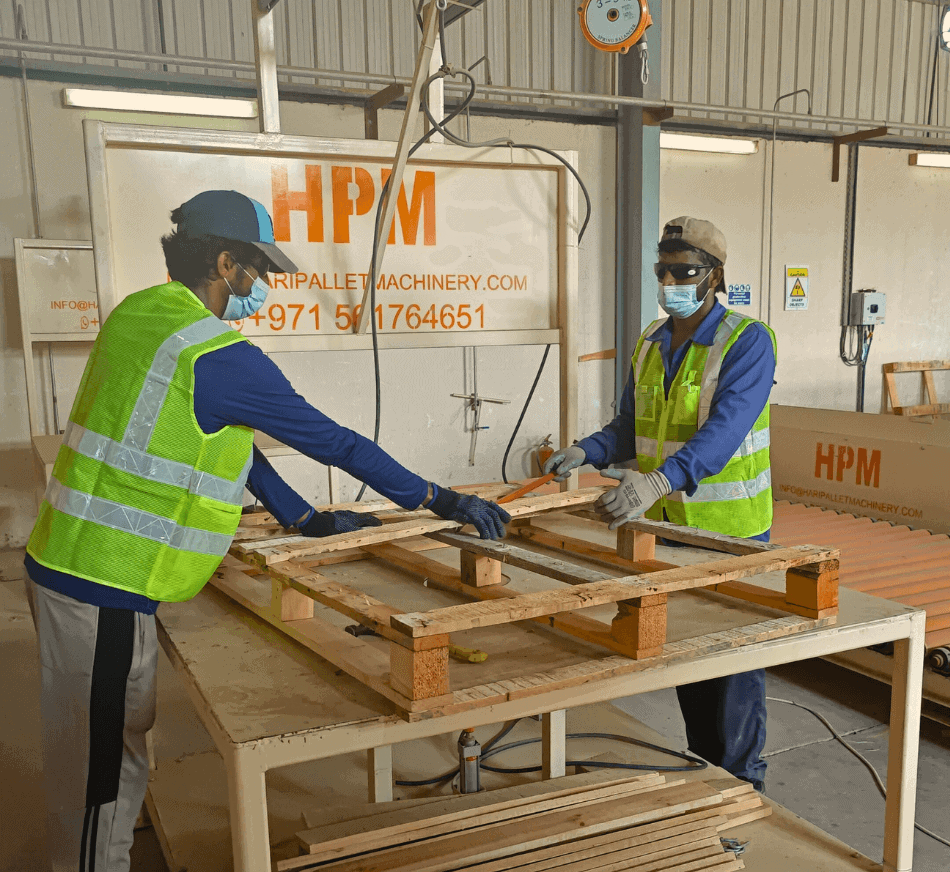 Pallet manufacturing workers assembling wooden pallets in factory, industrial, logistics, packing, shipping.
