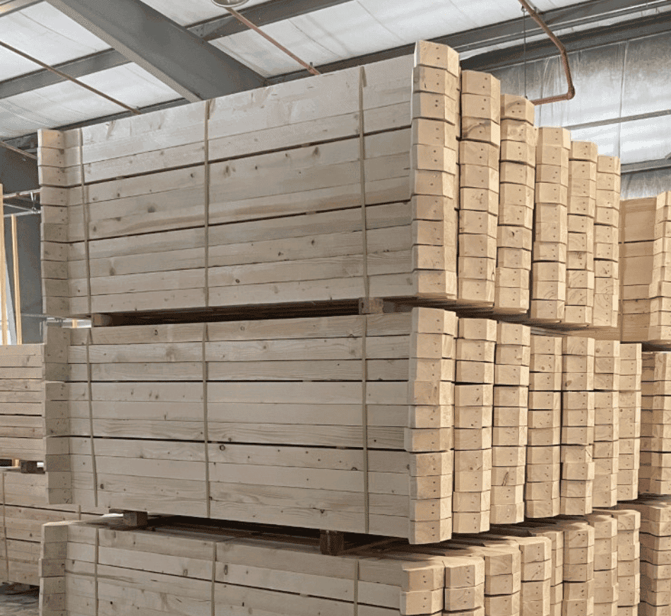 Stacked wooden wedges in a warehouse for shipping and logistics.