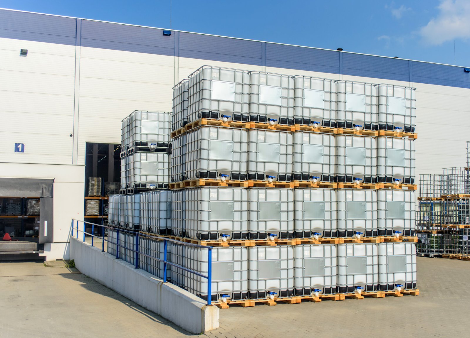 Packed,Pallets,Ibc,Conteiner,Of,Retail,Goods,Standing,Outdoors,At